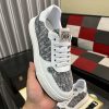 Diorsneaker_specificallyfeaturingagrayandwhitesnakeskin-likepatternonthesidepanels_1 Dior White Leather Grey Canvas Sneakers
