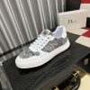 Diorsneaker_specificallyfeaturingagrayandwhitesnakeskin-likepatternonthesidepanels_2 Dior White Leather Grey Canvas Sneakers