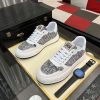 Diorsneaker_specificallyfeaturingagrayandwhitesnakeskin-likepatternonthesidepanels_3 Dior White Leather Grey Canvas Sneakers