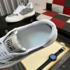 Diorsneaker_specificallyfeaturingagrayandwhitesnakeskin-likepatternonthesidepanels_4 Dior White Leather Grey Canvas Sneakers