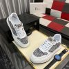 Diorsneaker_specificallyfeaturingagrayandwhitesnakeskin-likepatternonthesidepanels_5 Dior White Leather Grey Canvas Sneakers