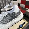 Diorsneaker_specificallyfeaturingagrayandwhitesnakeskin-likepatternonthesidepanels_7 Dior White Leather Grey Canvas Sneakers
