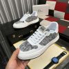 Diorsneaker_specificallyfeaturingagrayandwhitesnakeskin-likepatternonthesidepanels_8 Dior White Leather Grey Canvas Sneakers