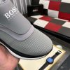 HugoBossslip-onsneakerinshadesofgray_withawhiteandblacksole._6 Boss Grey Mixed Materials Slip-On Trainer