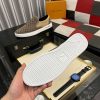 LV Brown Monogram Embossed Leather Slip-On Trainers
