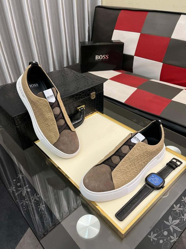 beigeHugoBossslip-onsneakerwithasuedetoecapandembossedBOSSbrandingontheside_1 BOSS Gary Italian Sneaker Beige and Brown