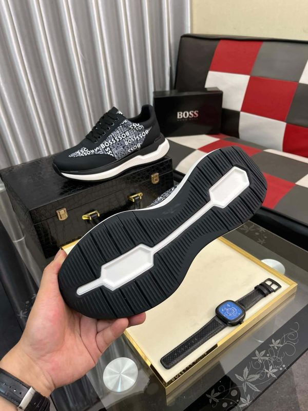 blackBOSSsneakerwiththebrandnamerepeatedinwhitetextontheside_1 Boss Black Mixed-Materials Trainers with Repeat Logo Details