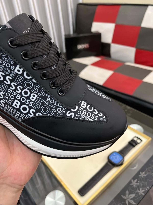 blackBOSSsneakerwiththebrandnamerepeatedinwhitetextontheside_7 Boss Black Mixed-Materials Trainers with Repeat Logo Details