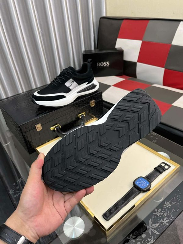 blackBOSSsneakerwithwhiteandgrayaccents_placedonablacktexturedsurface._2 BOSS Running-Inspired Trainers Black