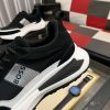 blackBOSSsneakerwithwhiteandgrayaccents_placedonablacktexturedsurface._3 BOSS Running-Inspired Trainers Black
