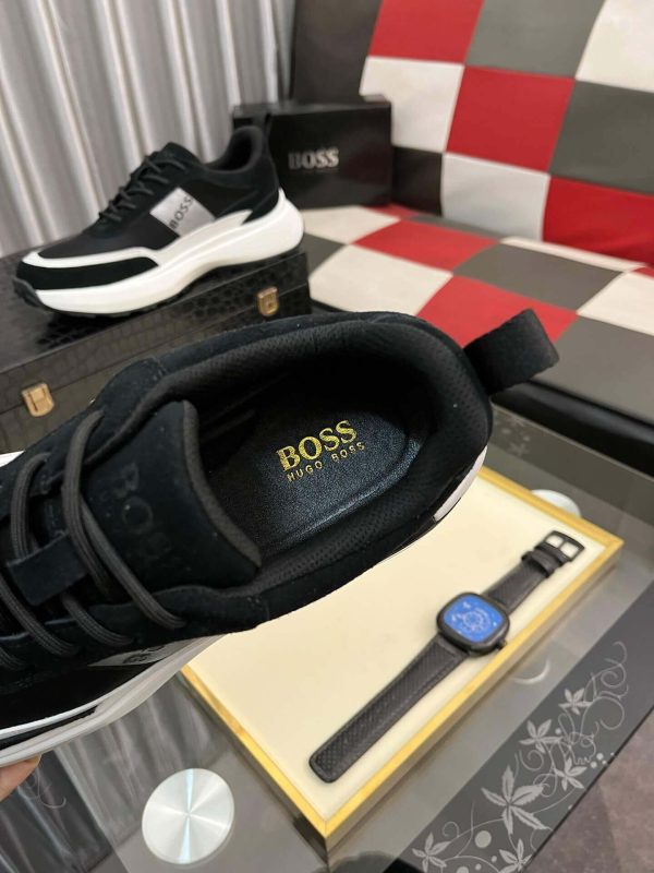 blackBOSSsneakerwithwhiteandgrayaccents_placedonablacktexturedsurface._4 BOSS Running-Inspired Trainers Black