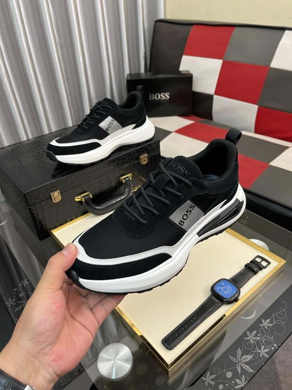 blackBOSSsneakerwithwhiteandgrayaccents_placedonablacktexturedsurface._5 BOSS Running-Inspired Trainers Black