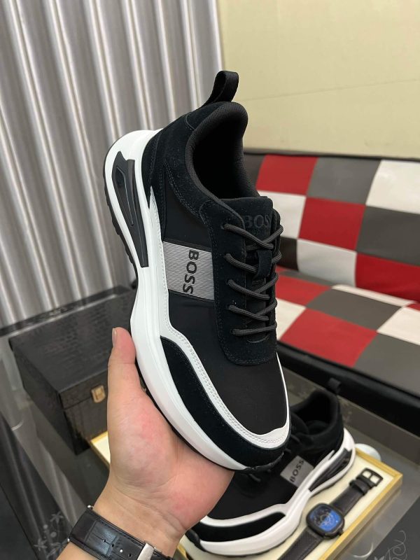blackBOSSsneakerwithwhiteandgrayaccents_placedonablacktexturedsurface._7 BOSS Running-Inspired Trainers Black