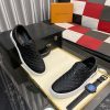blackleatherLouisVuittonslip-onsneakerwithawhitesole_8 LV Black Monogram Embossed Leather Slip-On Trainers