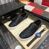 blackleatherLouisVuittonslip-onsneakerwithawhitesole_9 LV Black Monogram Embossed Leather Slip-On Trainers