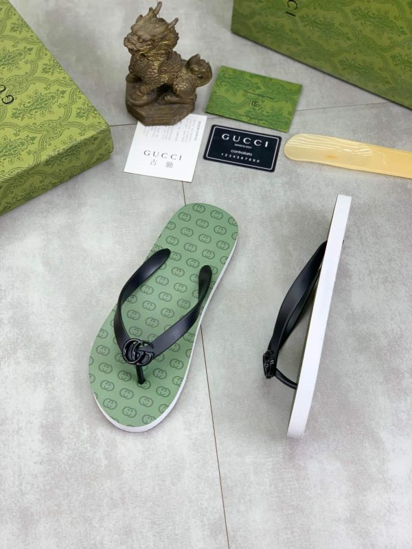 lightgreensoleadornedwiththeiconicinterlockingGGlogopatternandblackstrapswithaprominentGGemblematthecenter_3 Gucci Green Interlocking Jacquard Thong Sandals with Double G