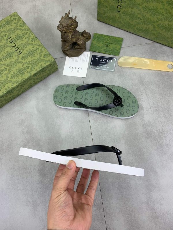lightgreensoleadornedwiththeiconicinterlockingGGlogopatternandblackstrapswithaprominentGGemblematthecenter_4 Gucci Green Interlocking Jacquard Thong Sandals with Double G