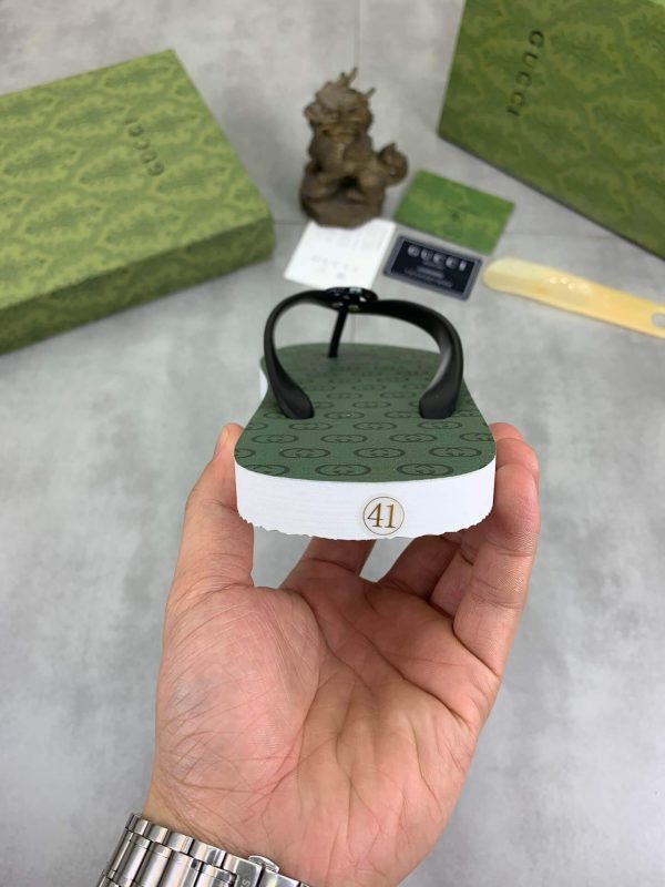lightgreensoleadornedwiththeiconicinterlockingGGlogopatternandblackstrapswithaprominentGGemblematthecenter_5 Gucci Green Interlocking Jacquard Thong Sandals with Double G