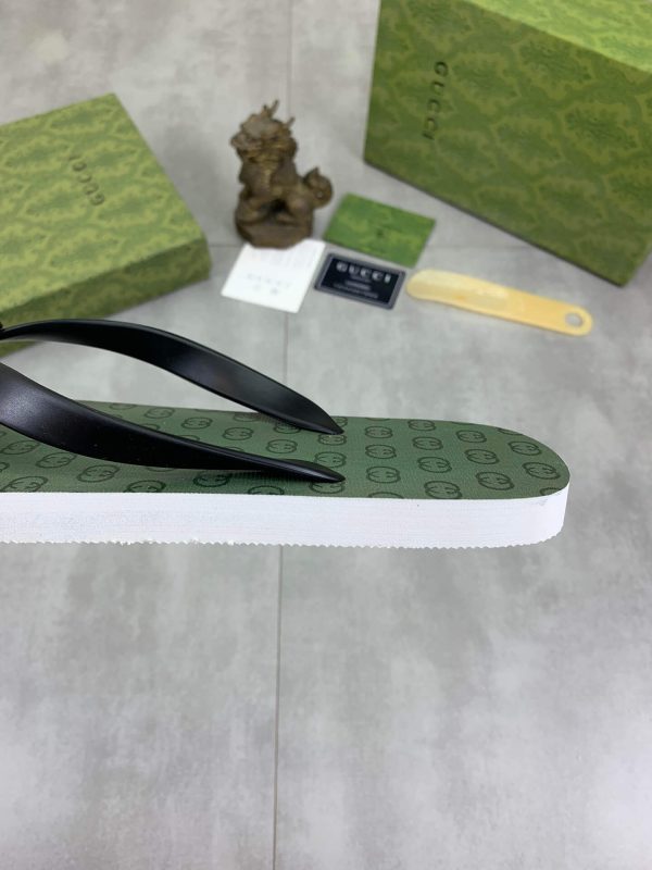 lightgreensoleadornedwiththeiconicinterlockingGGlogopatternandblackstrapswithaprominentGGemblematthecenter_6 Gucci Green Interlocking Jacquard Thong Sandals with Double G
