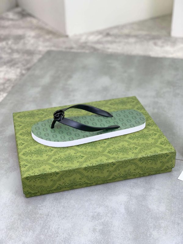 lightgreensoleadornedwiththeiconicinterlockingGGlogopatternandblackstrapswithaprominentGGemblematthecenter_8 Gucci Green Interlocking Jacquard Thong Sandals with Double G