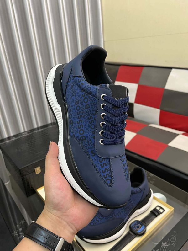 navybluesneakerwithwhiteandblackaccents_featuringtheBOSSlogorepeatedacrosstheupper_9 Boss Navy Blue Mixed-Materials Trainers with Repeat Logo Details