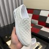 whiteLouisVuittonslip-onsneakerwiththebrand_smonogrampatternembossedacrosstheupper_7 LV Men's White Monogram Embossed Leather Slip-On Trainers