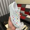whiteslip-onsneakerfeaturingacolorfulLouisVuittonmonogrampattern_6 LV X TM White Leather Slip-On Trainers
