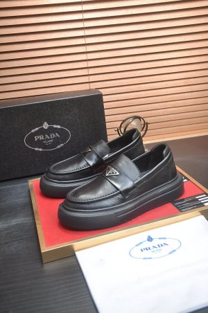 Prada Black Brushed Leather Platform Loafers with Enamel Triangle Logo