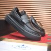 Prada Black Brushed Leather Platform Loafers with Enamel Triangle Logo