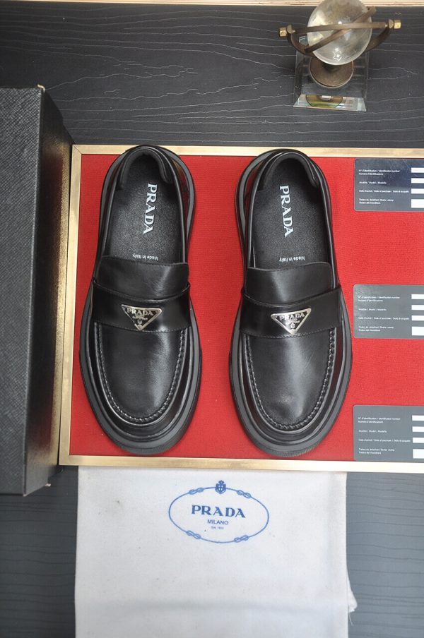 Prada Black Brushed Leather Platform Loafers with Enamel Triangle Logo