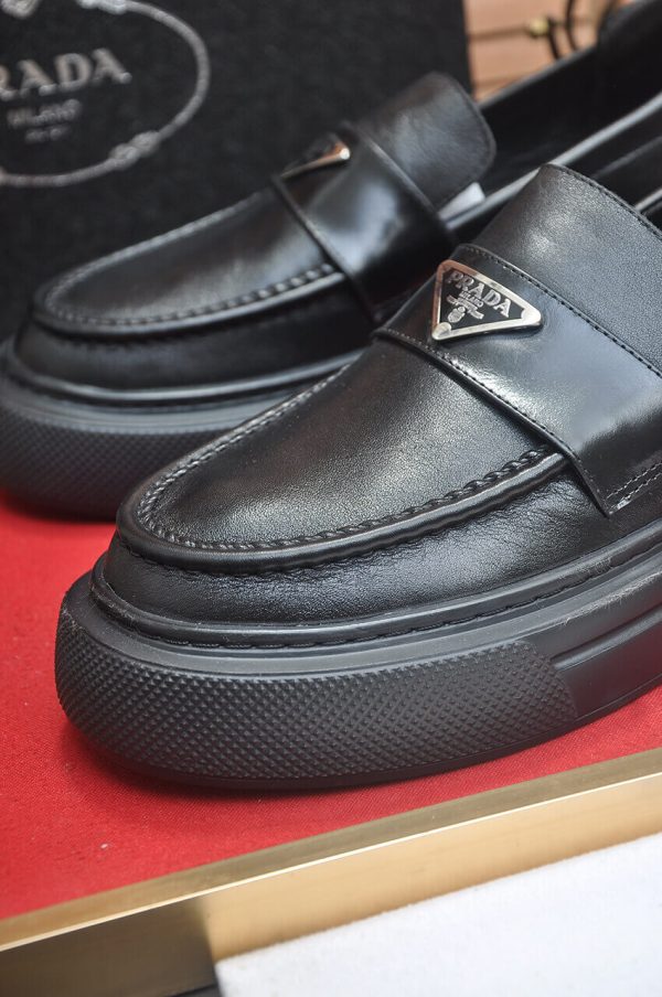 Prada Black Brushed Leather Platform Loafers with Enamel Triangle Logo