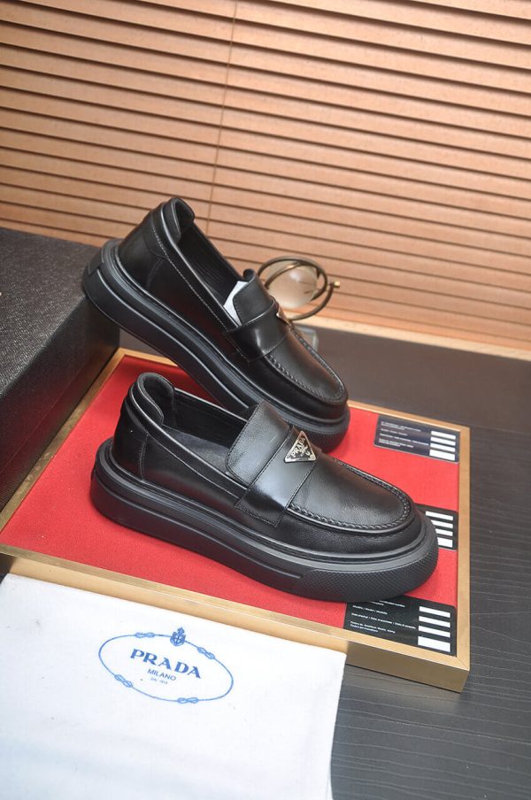Prada Black Brushed Leather Platform Loafers with Enamel Triangle Logo