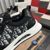 Diormen_ssneakerfeaturingablackandwhitecolorschemewiththeDiorObliquepattern_4 Dior Men's Sneaker in Black Dior Oblique Jacquard and Black Leather