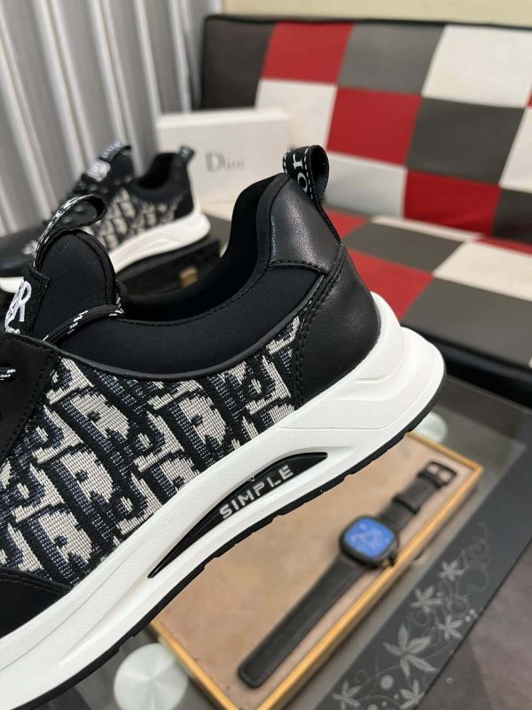 Diormen_ssneakerfeaturingablackandwhitecolorschemewiththeDiorObliquepattern_4 Dior Men's Sneaker in Black Dior Oblique Jacquard and Black Leather
