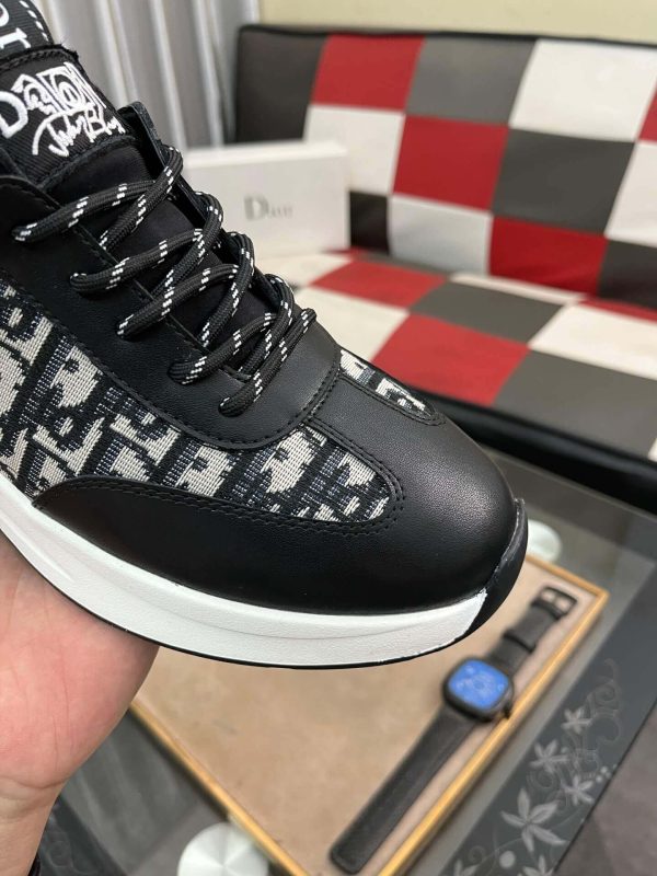 Diormen_ssneakerfeaturingablackandwhitecolorschemewiththeDiorObliquepattern_5 Dior Men's Sneaker in Black Dior Oblique Jacquard and Black Leather