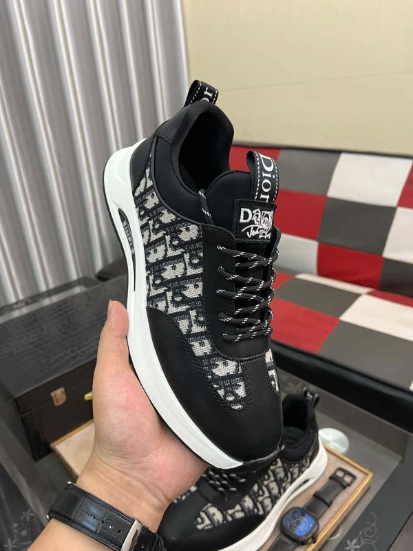 Diormen_ssneakerfeaturingablackandwhitecolorschemewiththeDiorObliquepattern_8 Dior Men's Sneaker in Black Dior Oblique Jacquard and Black Leather