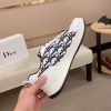 Diorsneaker_likelytheDiorB23LowTopLogoObliquemodel_1 Dior White and Black Dior Oblique Jacquard Runner Sneaker