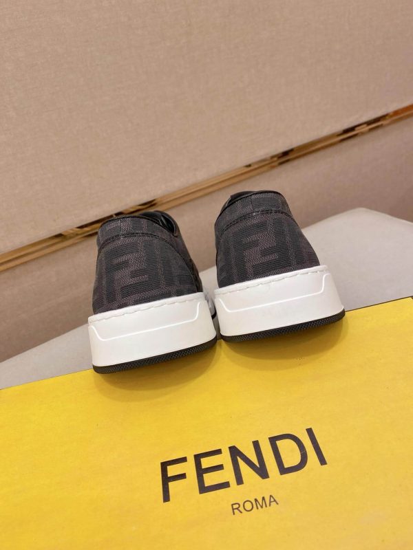 Black & White Fendi Flow Sneaker or a similar low-top lace-up style featuring the signature FF motif.
