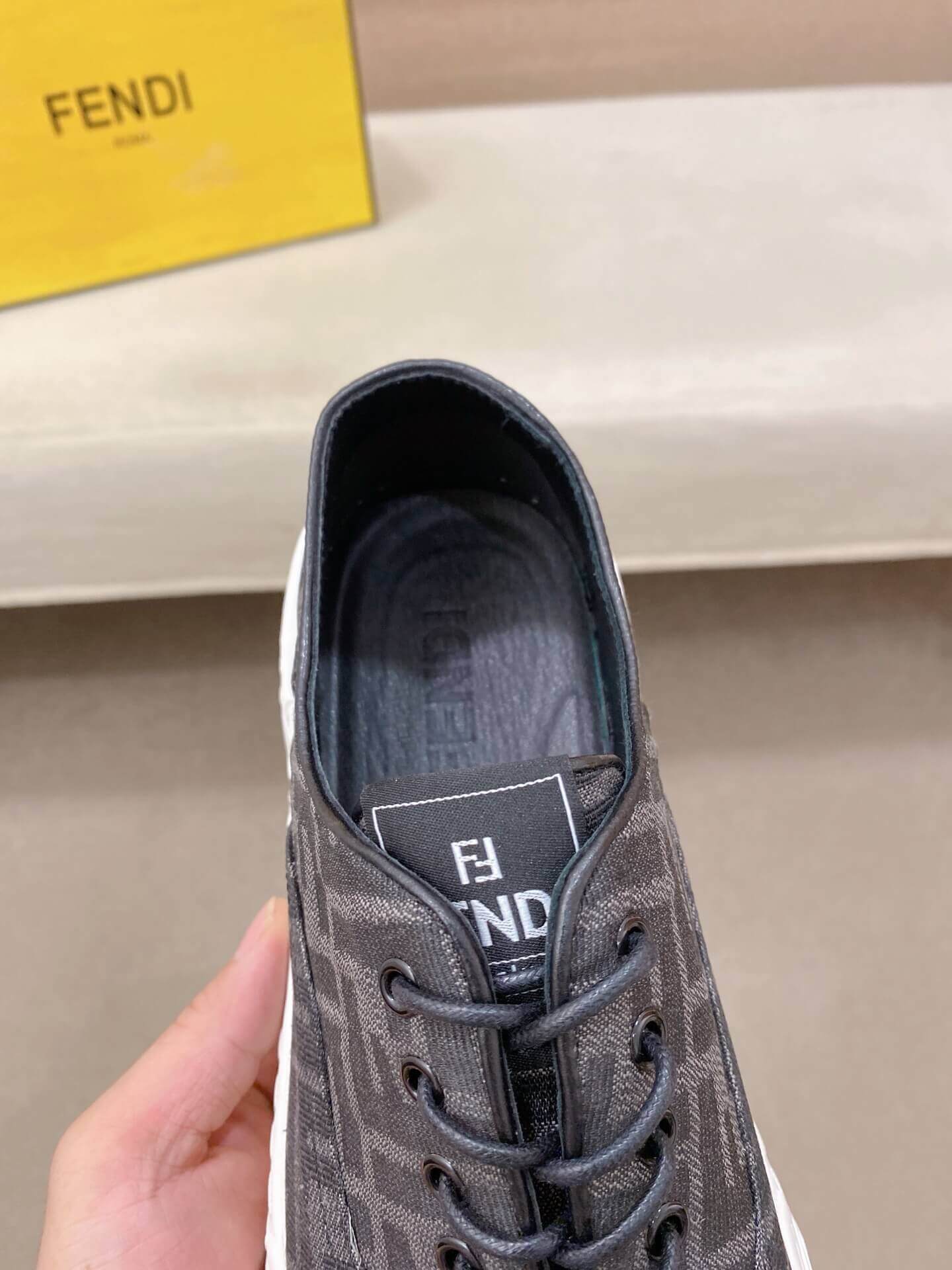 Black & White Fendi Flow Sneaker or a similar low-top lace-up style featuring the signature FF motif. 2 Black & White Fendi Flow Sneaker or a similar low-top lace-up style featuring the signature FF motif. - Image 2