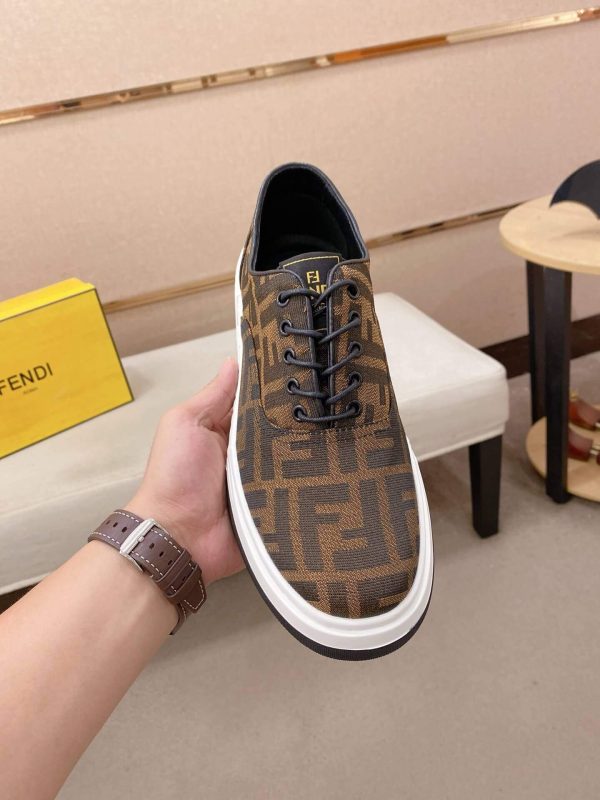 Brown & Black Fendi Flow Sneaker or a similar low-top lace-up style featuring the signature FF motif.