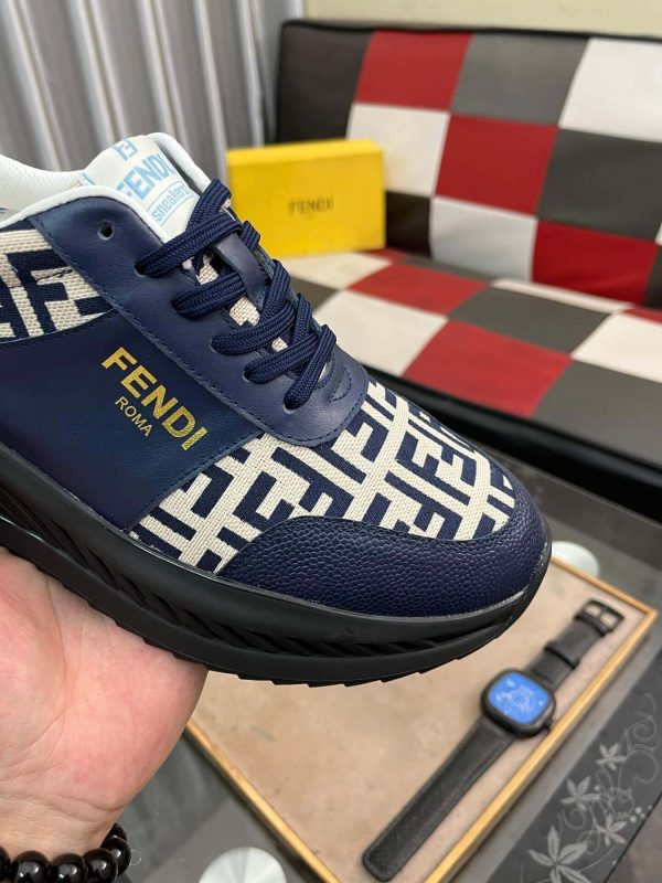 Fendisneaker_predominantlynavybluewiththebrand_siconicFFlogopatterninbeigeandnavyonthetoeandsides_2 Fendi Roma Sneaker in Beige FF Jacquard and Blue Leather