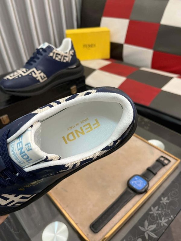 Fendisneaker_predominantlynavybluewiththebrand_siconicFFlogopatterninbeigeandnavyonthetoeandsides_3 Fendi Roma Sneaker in Beige FF Jacquard and Blue Leather