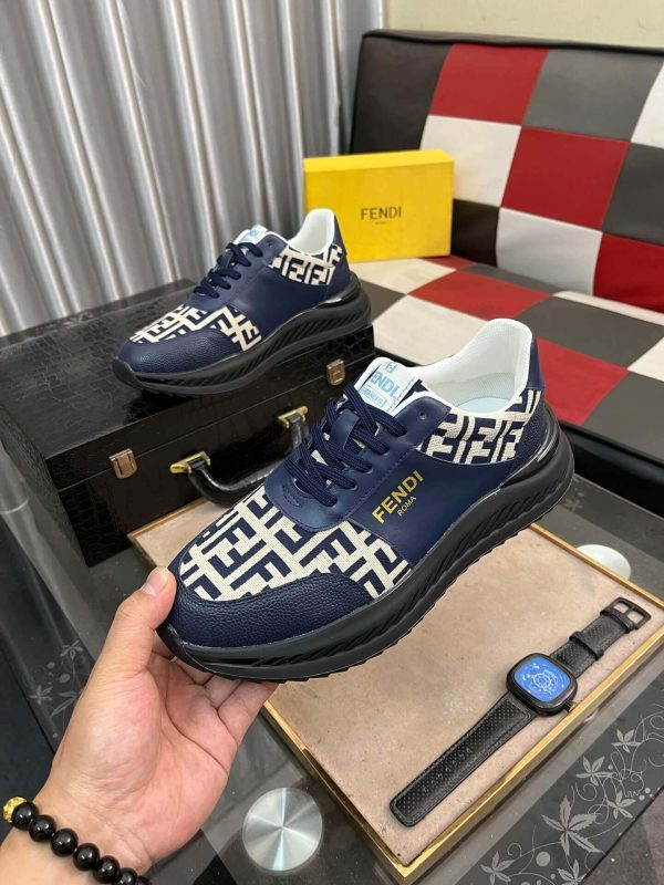 Fendisneaker_predominantlynavybluewiththebrand_siconicFFlogopatterninbeigeandnavyonthetoeandsides_9 Fendi Roma Sneaker in Beige FF Jacquard and Blue Leather