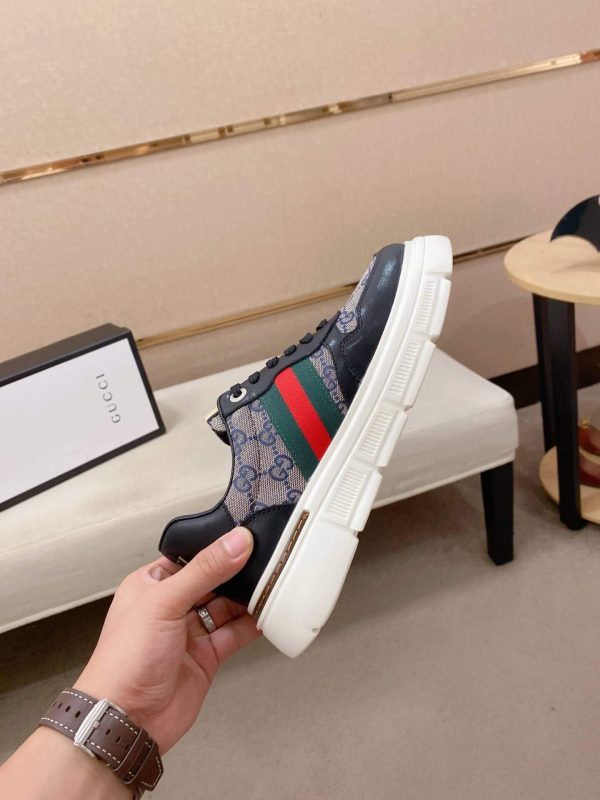 GucciAcesneakerwithWebinGGSupreme_6_604c7cbf-7168-4137-a22d-87543c841bfa Black Gucci Monogram GG Supreme Ace Sneakers