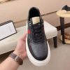 Black Gucci Monogram Ace Sneakers with Web