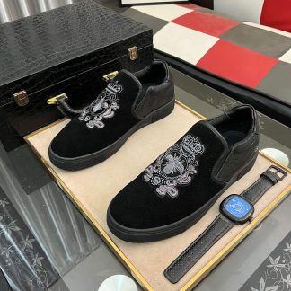 Gucci Men's Slip-On Loafers with An Embellished Crest Design.