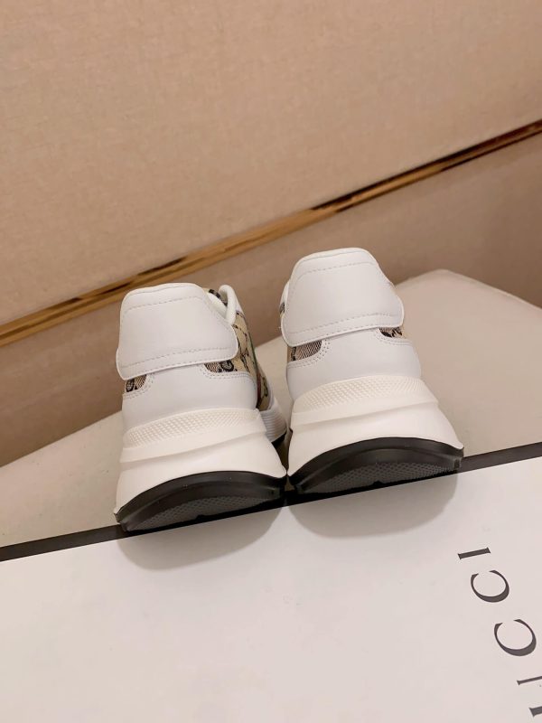 GucciNansneakerfeaturingthebrand_ssignatureGGmonogramcanvas_2 (1) Gucci Brown GG Canvas and White Leather Re-Motion Sneaker