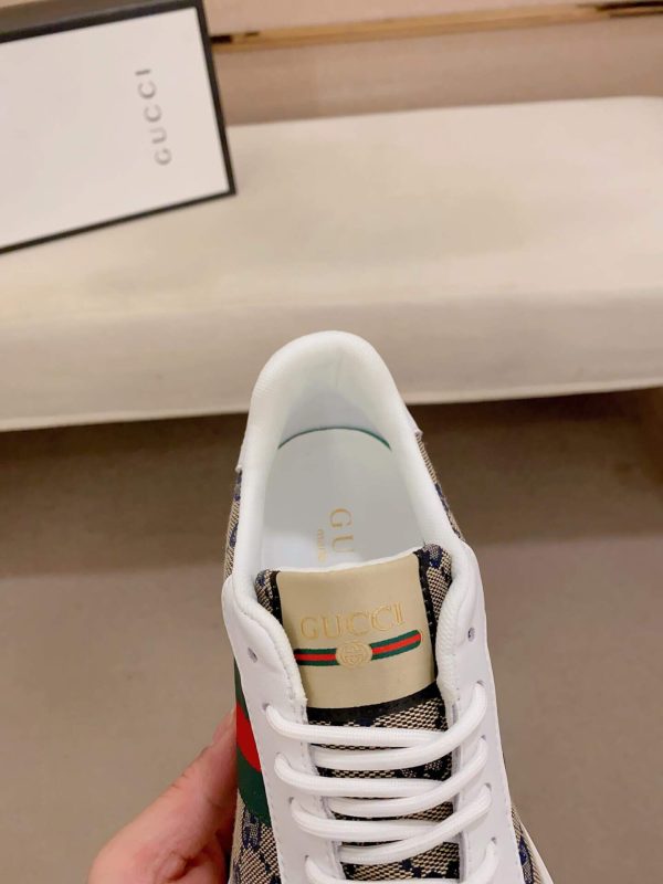 GucciNansneakerfeaturingthebrand_ssignatureGGmonogramcanvas_5 Gucci Brown GG Canvas and White Leather Re-Motion Sneaker