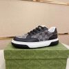 GucciRhytonSneakers_5_a8f96c3a-a5d7-46d4-8665-4a81745d65af Gucci Men's GG Trainer in Beige and Blue GG Canvas and Black Leather