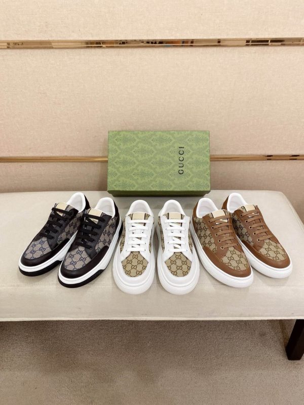 GucciRhytonSneakers_6_cc3d81d2-f921-43c0-a1c0-9aaec97cba52 Gucci Men's GG Trainer in Beige and Blue GG Canvas and Black Leather